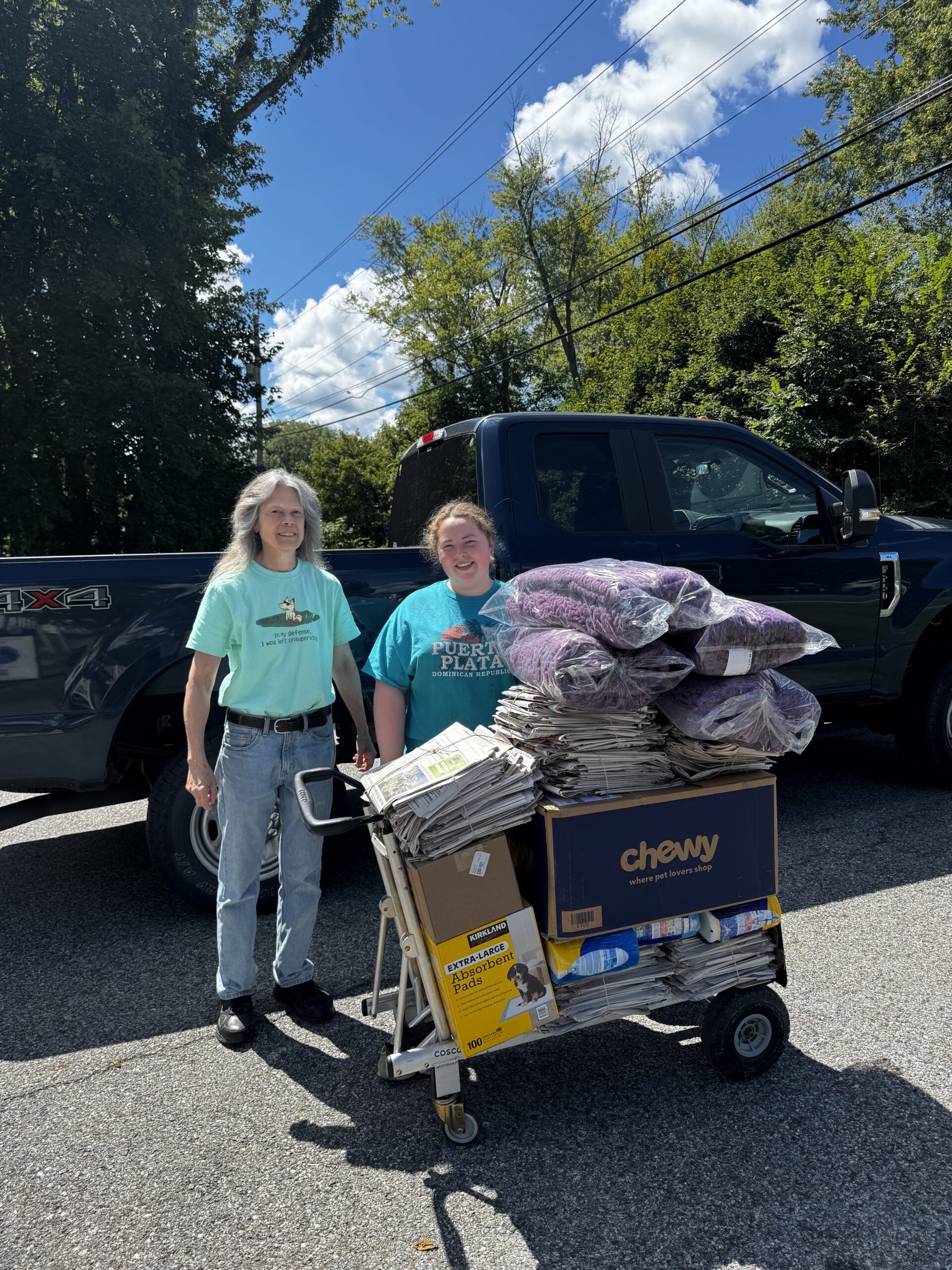 Past Happy Life Animal Rescue adopter donating supplies