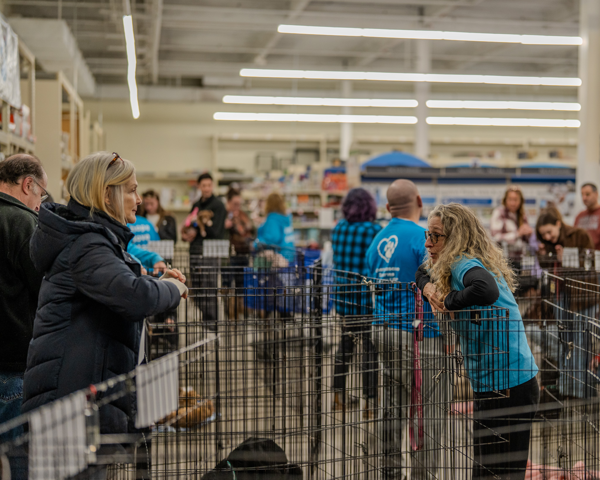 Happy Life Animal Rescue volunteers and staff at an adoption event